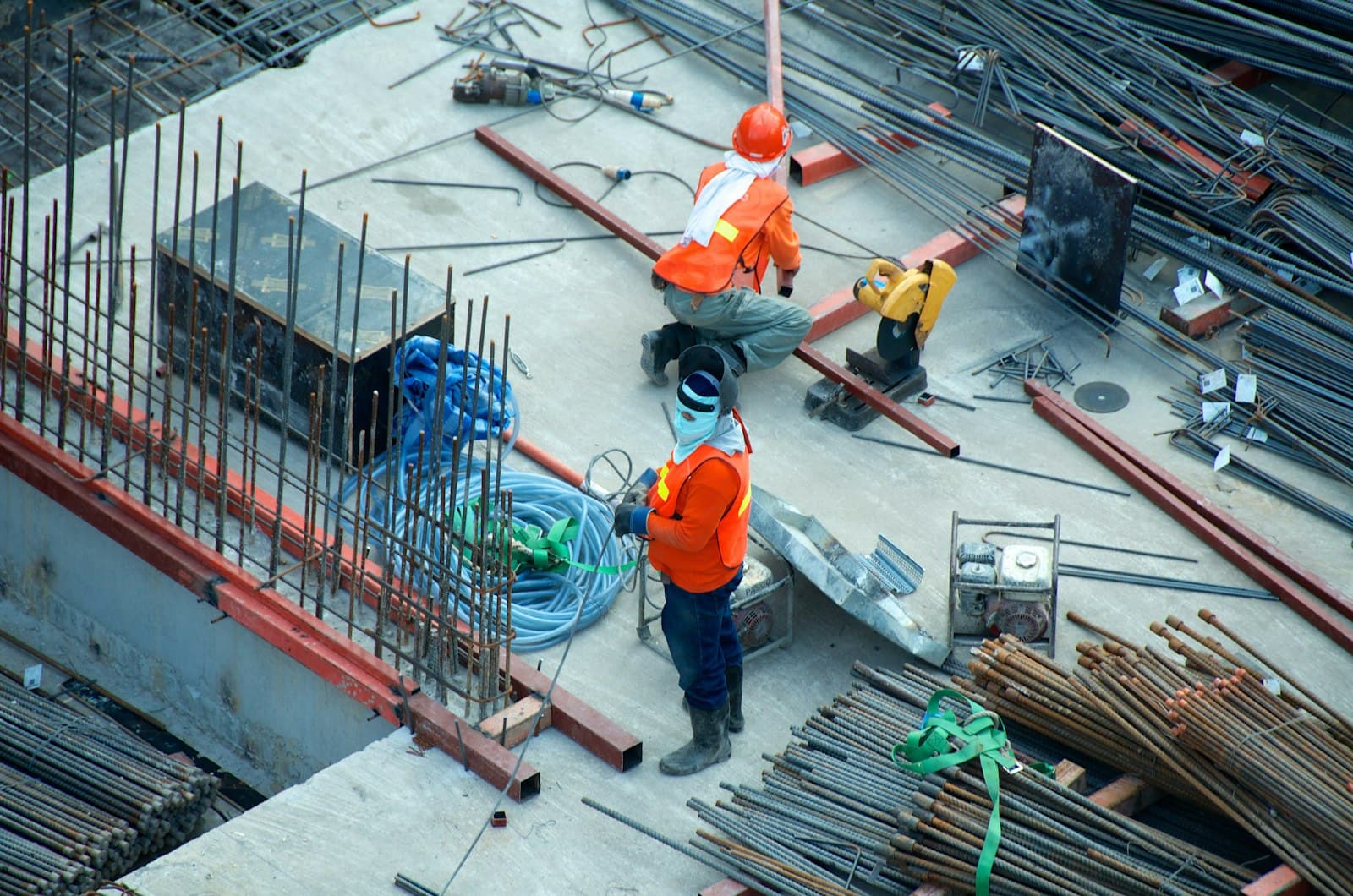 Construction site with cranes against an open sky